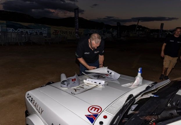 Person working on Rally Car